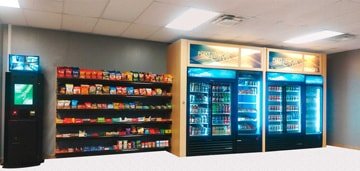 Micro Market Kiosk with snacks, drinks, and check out terminal