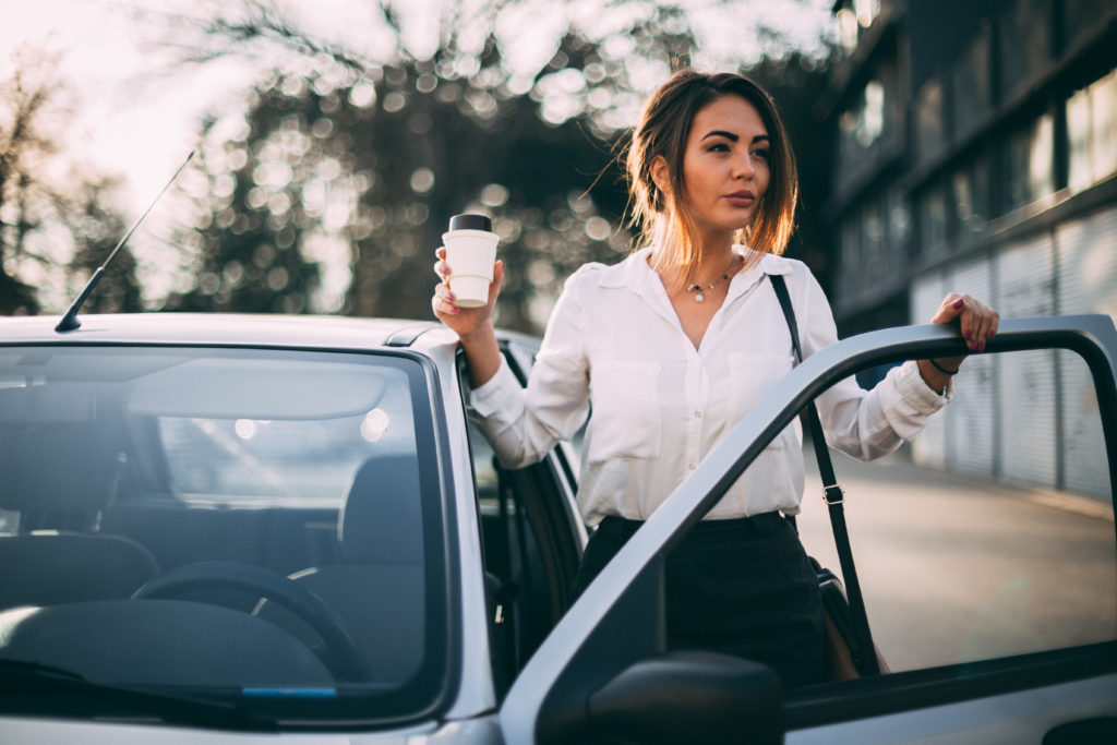 employee driving to pick up coffee